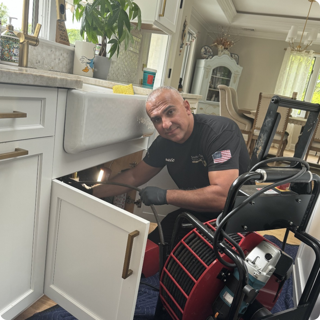 Plumber working on site